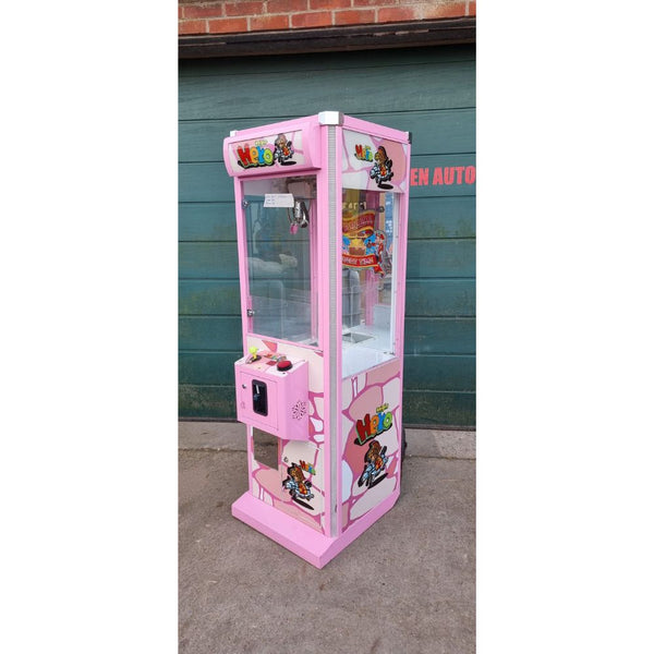 A used Knight Hero crane grabber in pink.