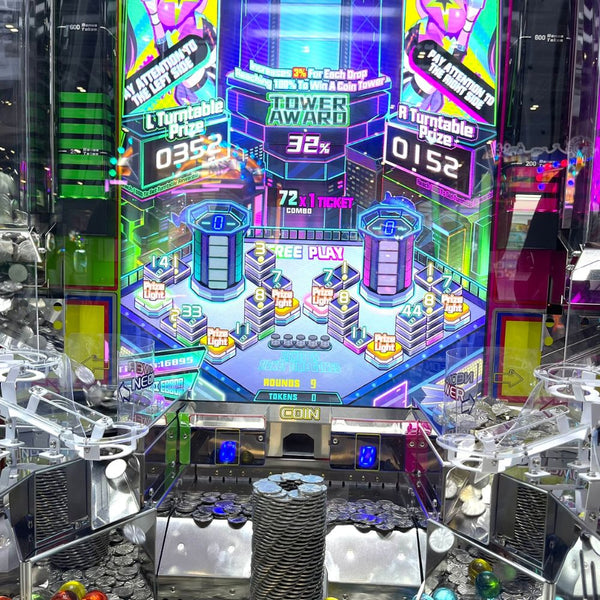 UNIS Neon Tower Twin - A Modern Twist on the Coin Pusher