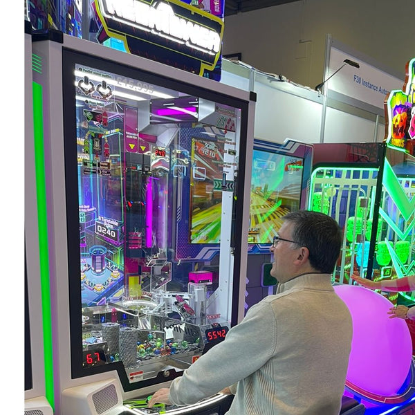 UNIS Neon Tower Twin - A Modern Twist on the Coin Pusher