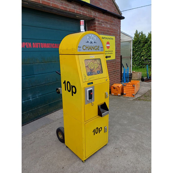 A used Thomas 10p change machine in yellow.
