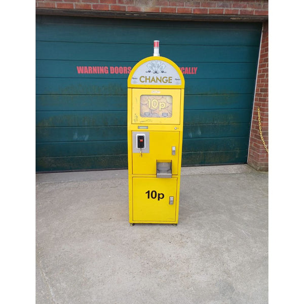 A used Thomas 10p change machine in yellow.