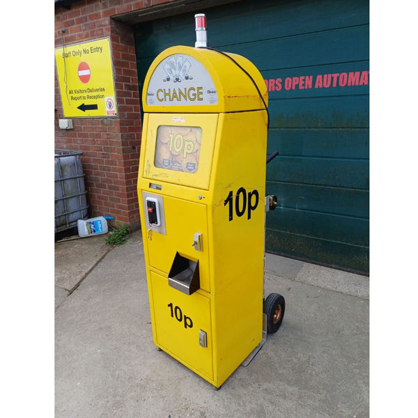 A used Thomas 10p change machine in yellow.
