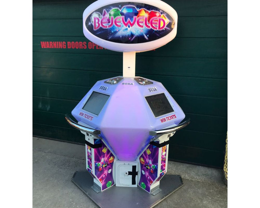 A Used SEGA Bejeweled Ticket Redemption 2 Player machine in working but used condition.