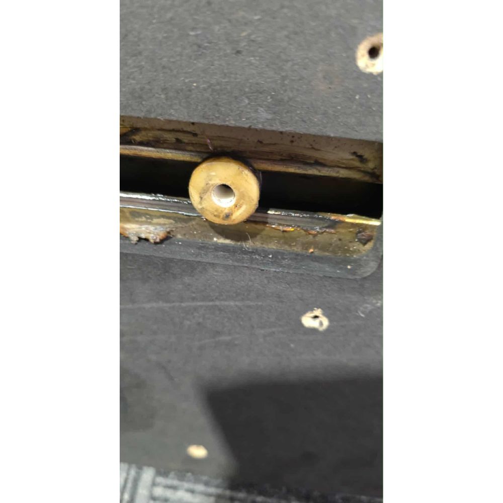A nylon wheel that goes under the bed on a Harry levy pusher.
